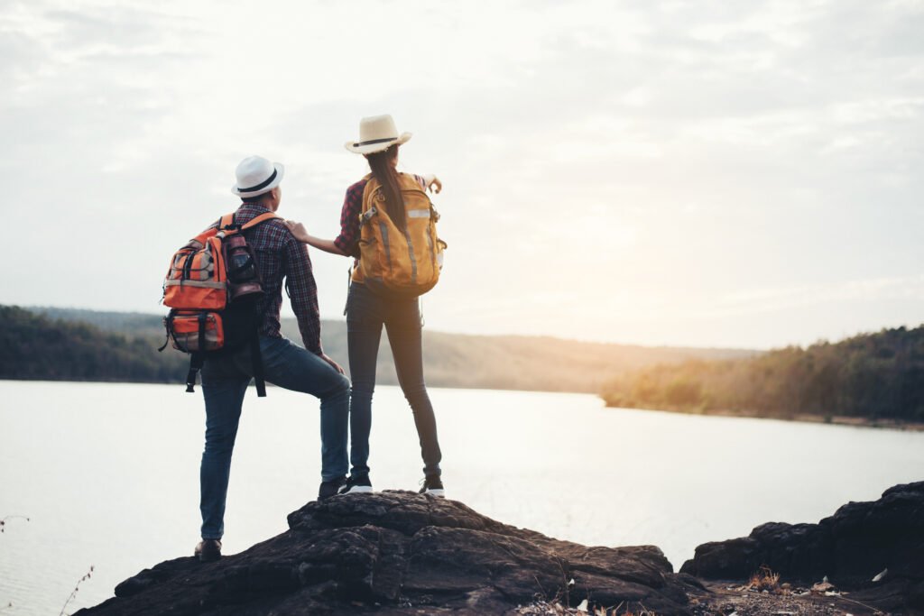 Couple on hiking with osprey Backpacks